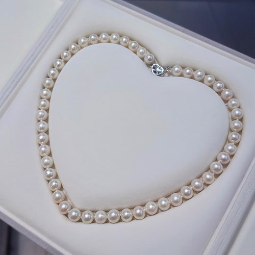 Pearl necklace in a heart-shaped box