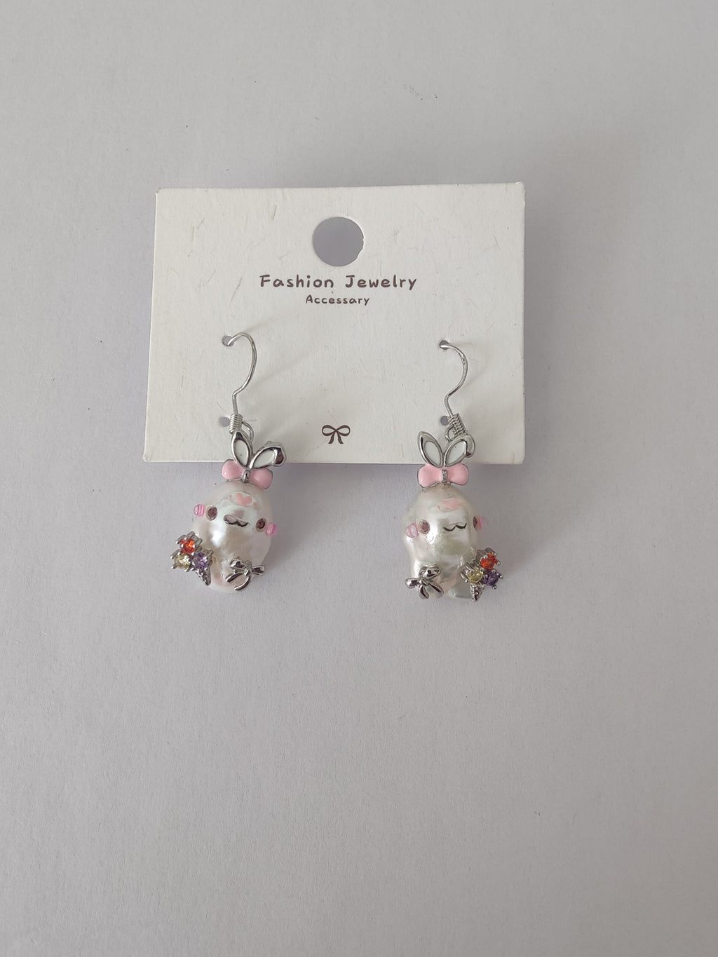 Unique handmade baroque pearl bunny earrings with zirconia accents