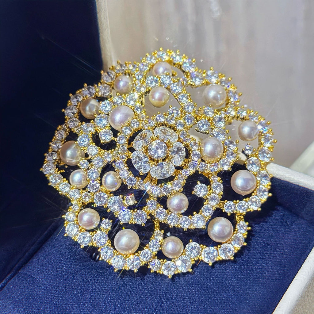 Gold vermeil pearl brooch in natural light