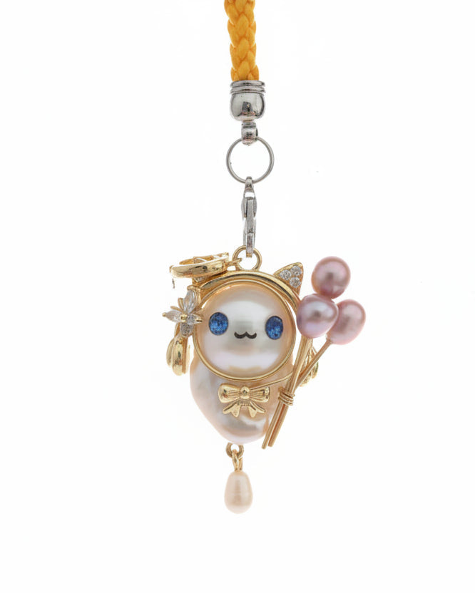 Playful baroque pearl character pendant with gold setting