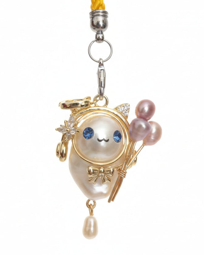 Statement baroque pearl pendant with character face and pink pearl balloon in white background