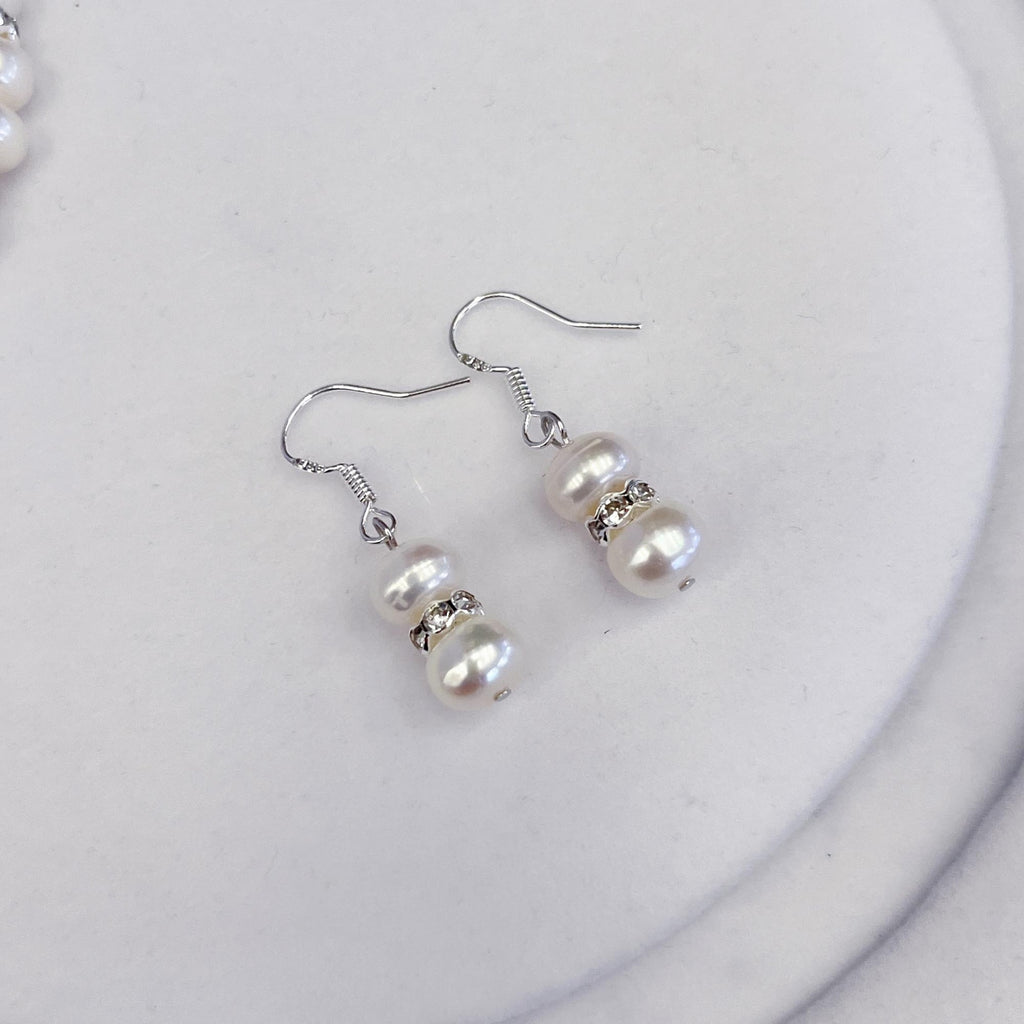 Freshwater pearl drop earrings from jewelry set in natural light