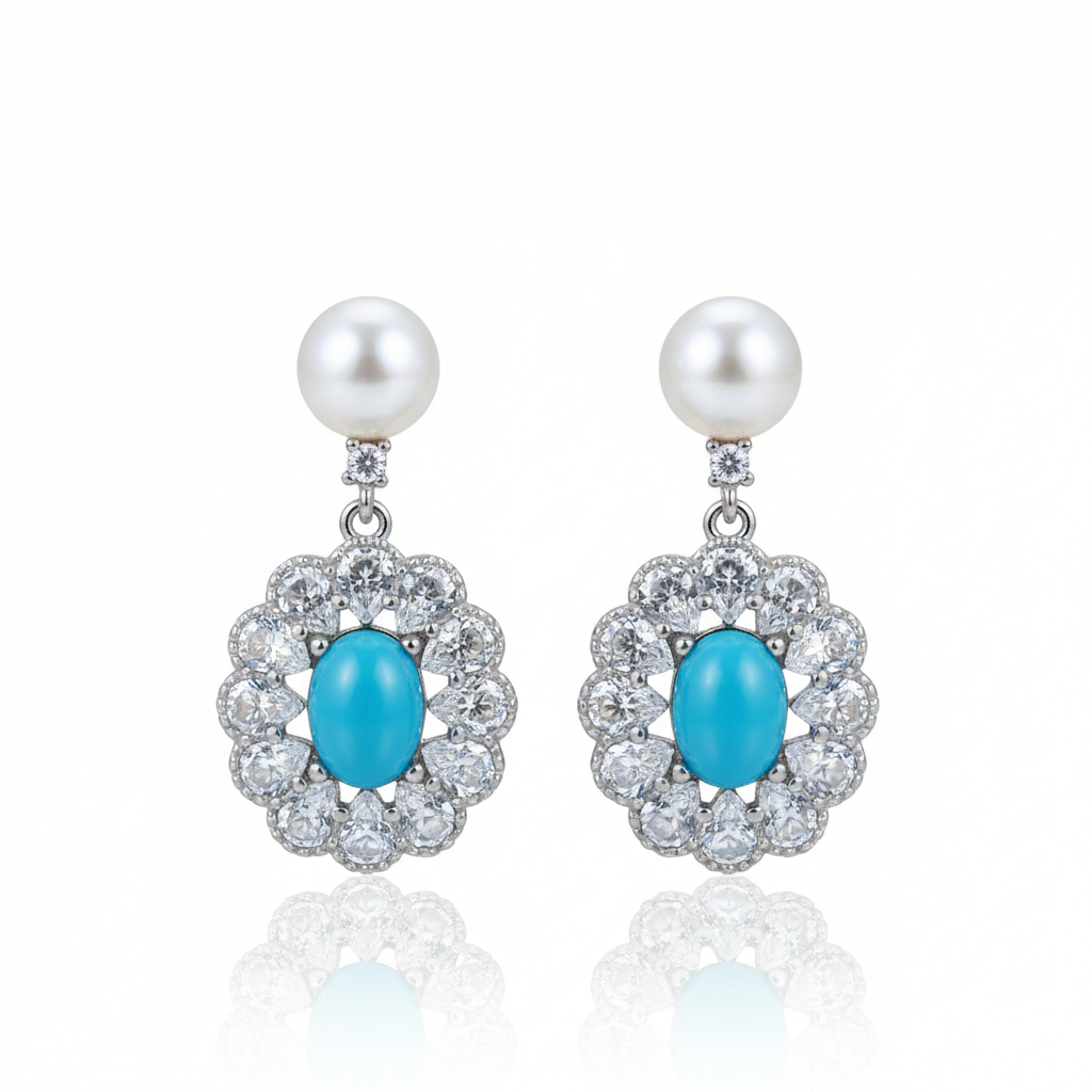 Pearl turquoise drop earrings with zirconia on white background