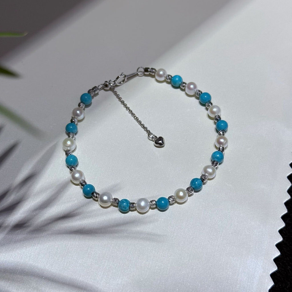 Close-up of sterling silver clasp and adjustable chain