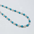 Pearl and turquoise beaded necklace sterling silver on white background