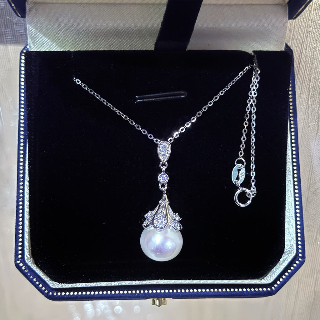 Pearl necklace with silver chain in a jewelry box-zorapearls